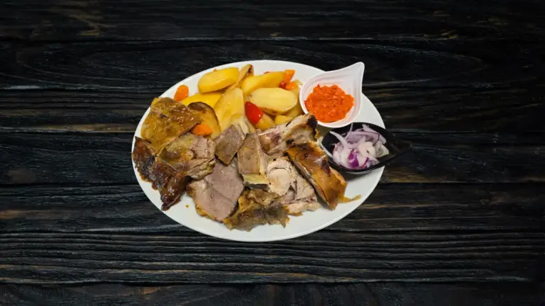 Spit-roasted suckling pig and lamb with a side dish