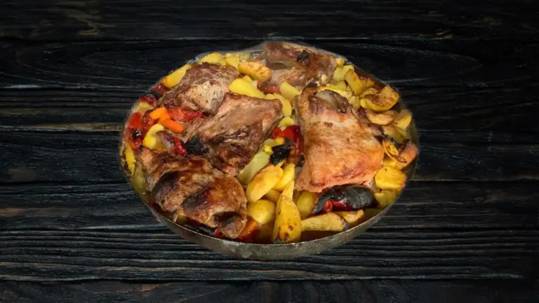 Veal roasted under the bell lid with a side dish